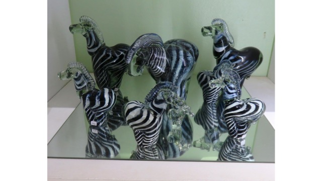 Eswatini's animals are represented lin glass